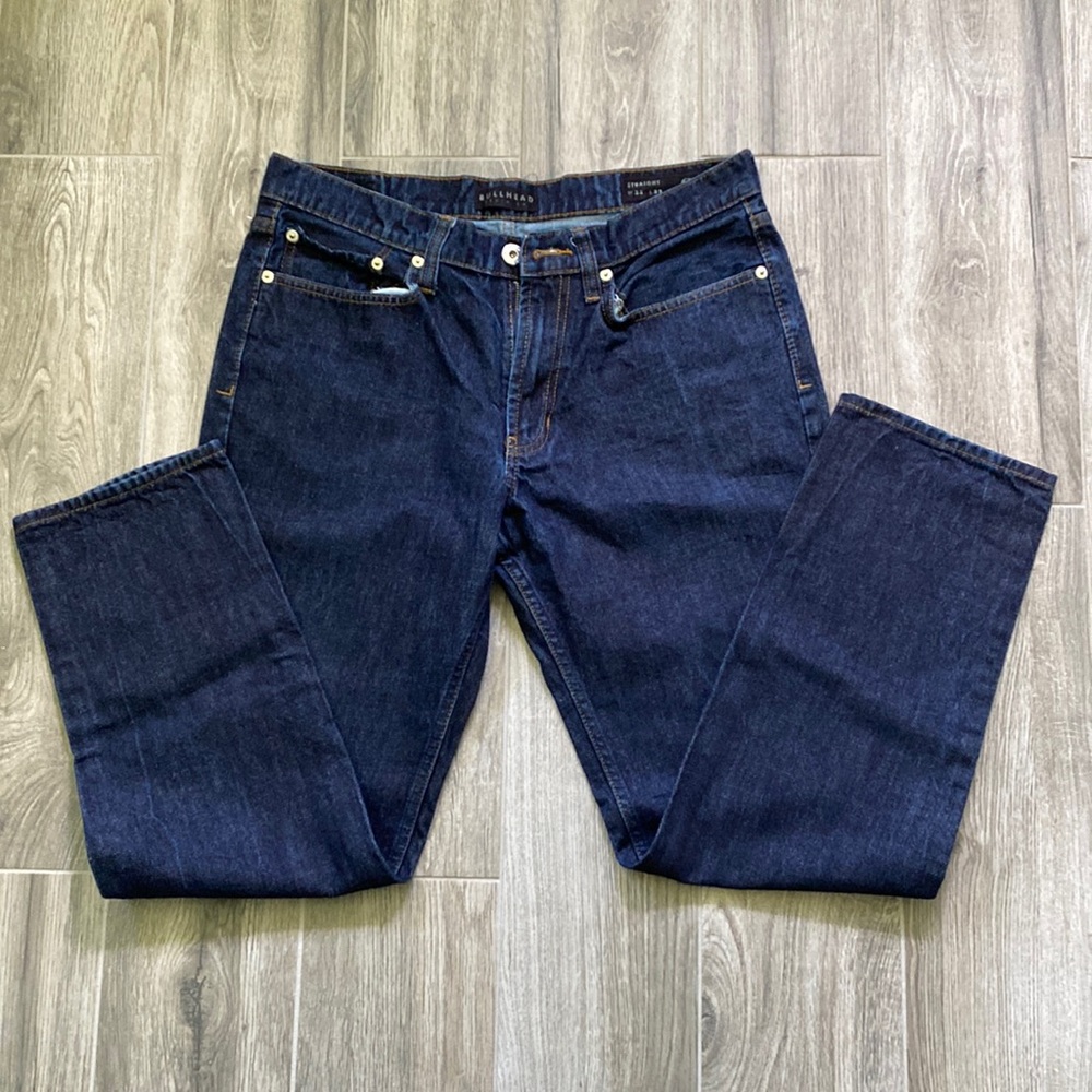 Men’s dark wash straight jeans.
